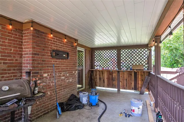 a backyard of a house with wooden fence