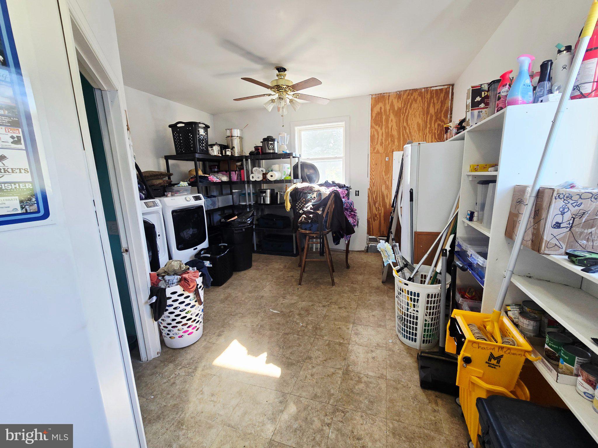 540 Plum Run Road Sugar Grove, WV 26815 - Photo 15 of 45 Spacious utility room with natural light.