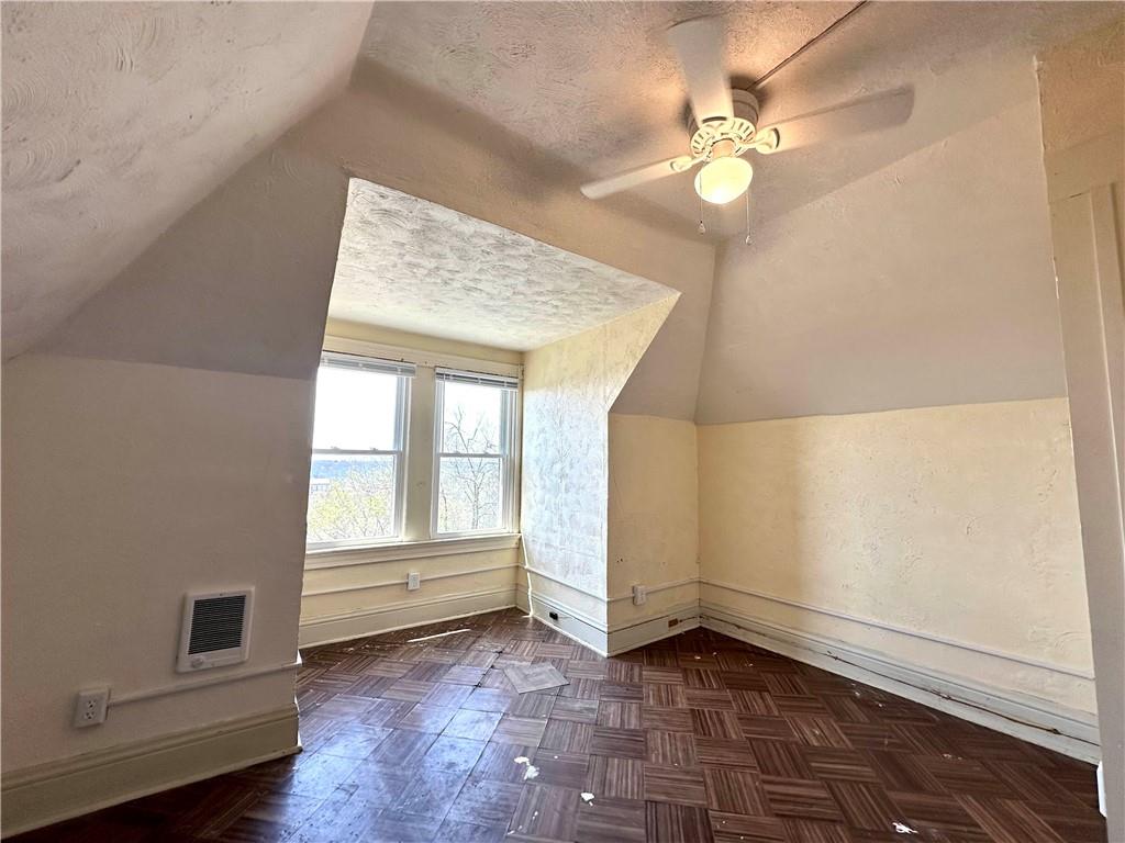 545 Forest Avenue Pittsburgh, PA 15202 - Photo 14 of 26 wooden floor in an empty room with a window