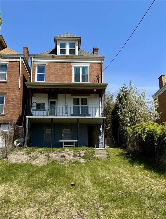 545 Forest Avenue Pittsburgh, PA 15202 - Photo 18 of 26 a front view of a house with a yard