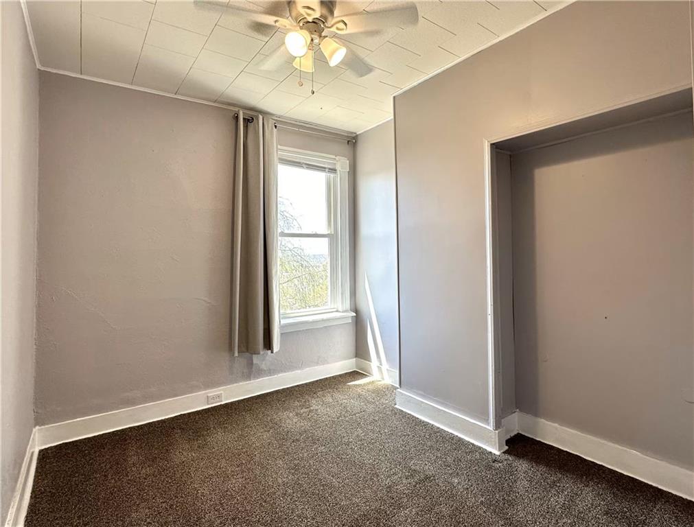 545 Forest Avenue Pittsburgh, PA 15202 - Photo 25 of 26 an empty room with windows and fan