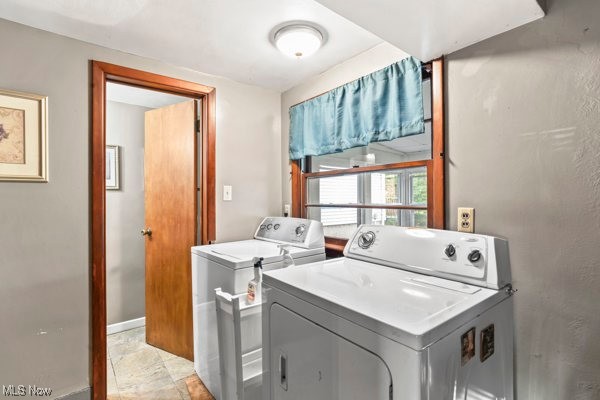 14413 Macklin Road New Springfield, OH 44443 - Photo 45 of 49 Laundry room with baseboards and separate washer and dryer