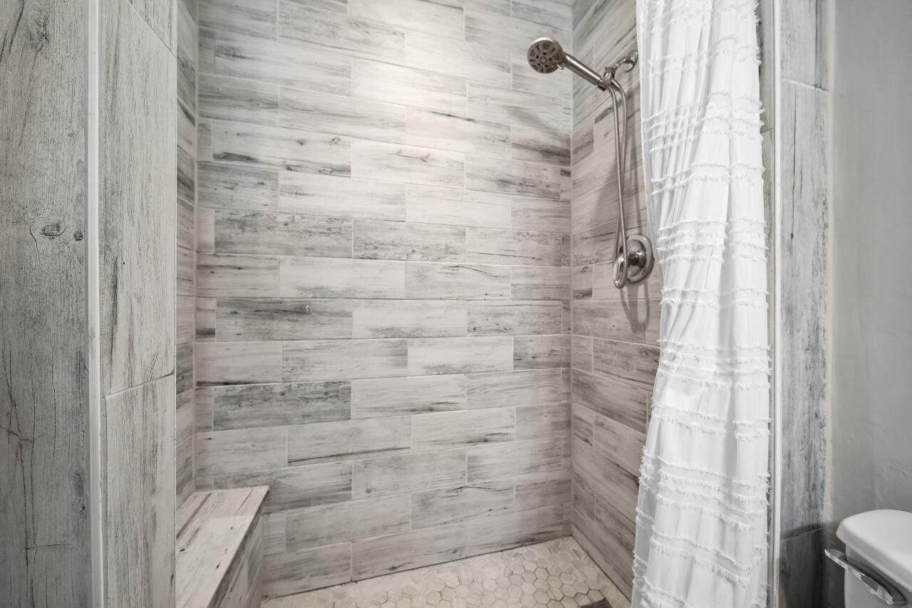 481 Warren Street Sebastian, FL 32958 - Photo 20 of 33 a bathroom with a shower