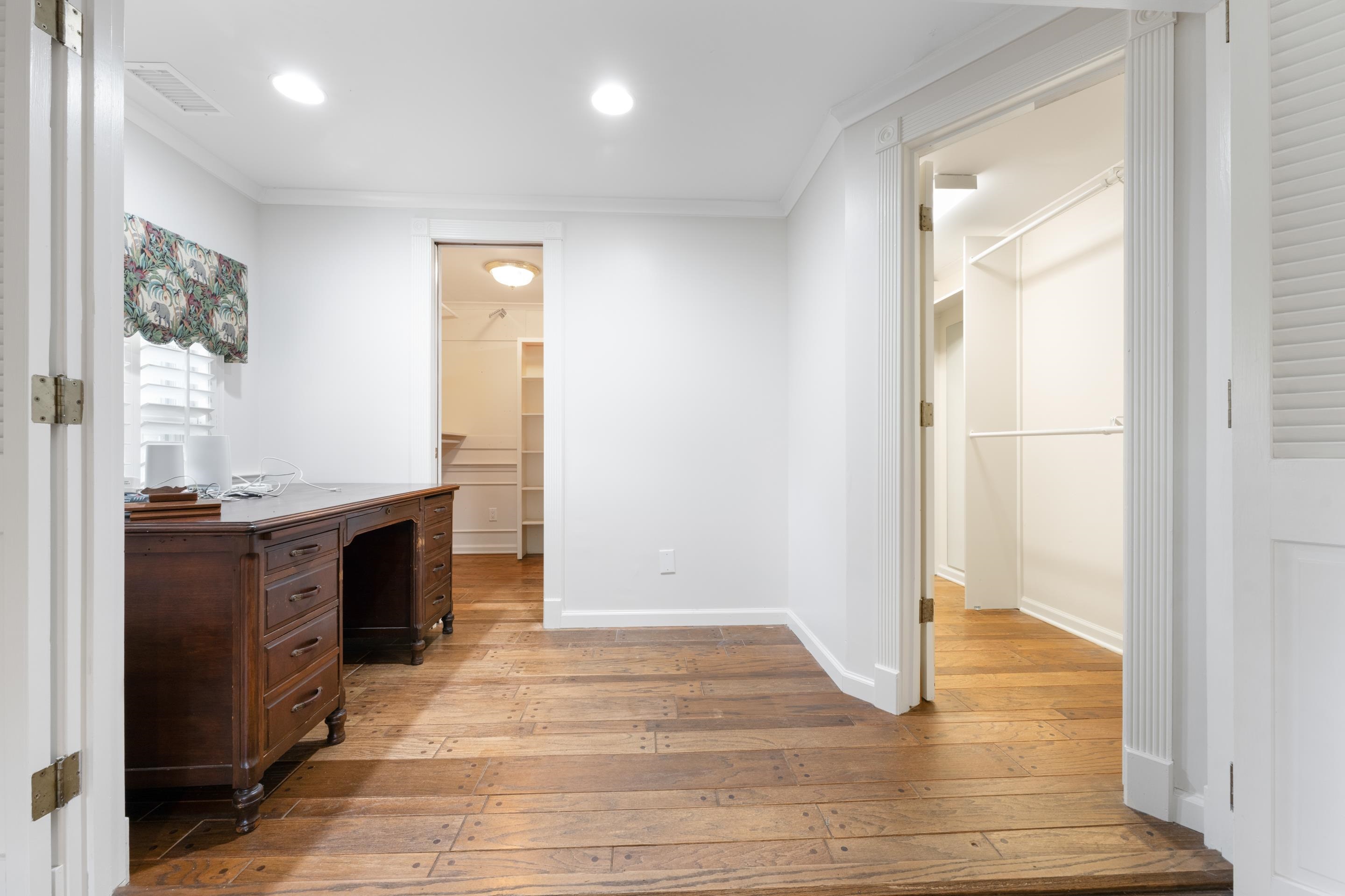 5360 Normandy Road Memphis, TN 38120 - Photo 12 of 40 a bathroom with a sink and a mirror