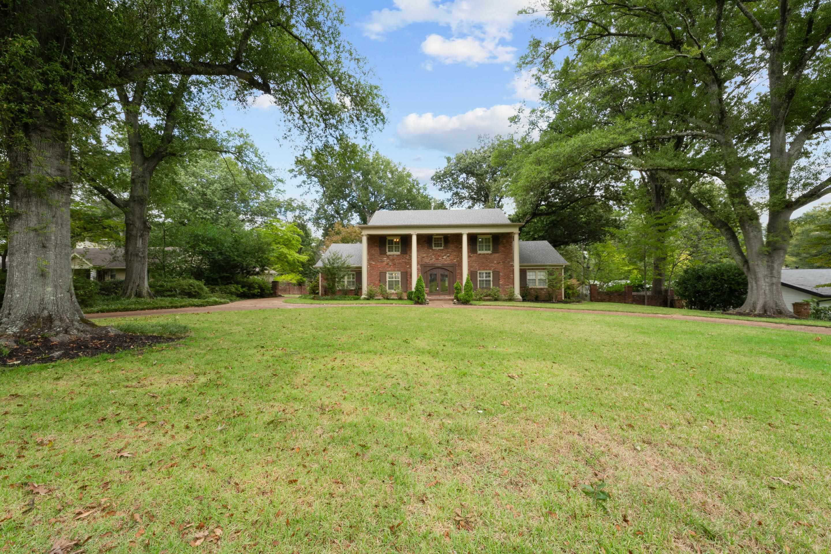 5360 Normandy Road Memphis, TN 38120 - Photo 2 of 40 a front view of house with yard and green space