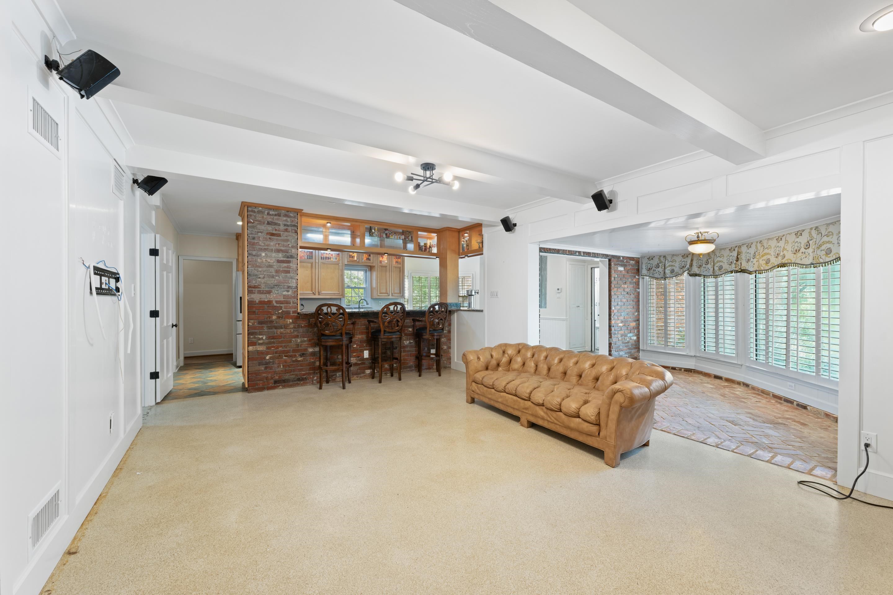 5360 Normandy Road Memphis, TN 38120 - Photo 27 of 40 a living room with furniture and a large window