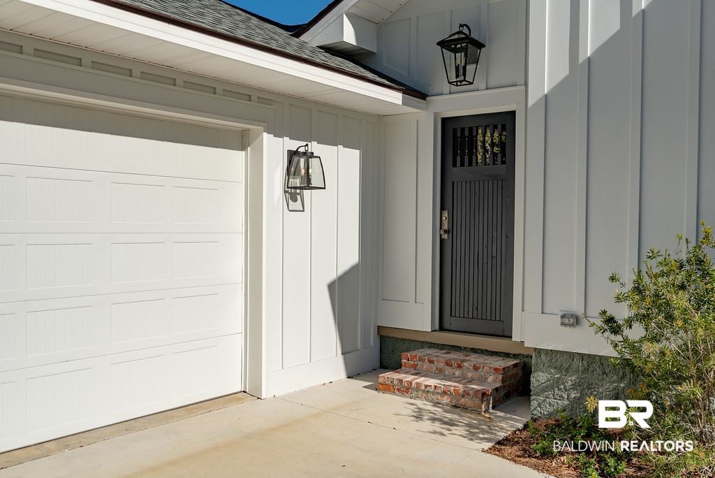 389 Pecan Avenue Fairhope, AL 36532 - Photo 41 of 50 Secured front porch door