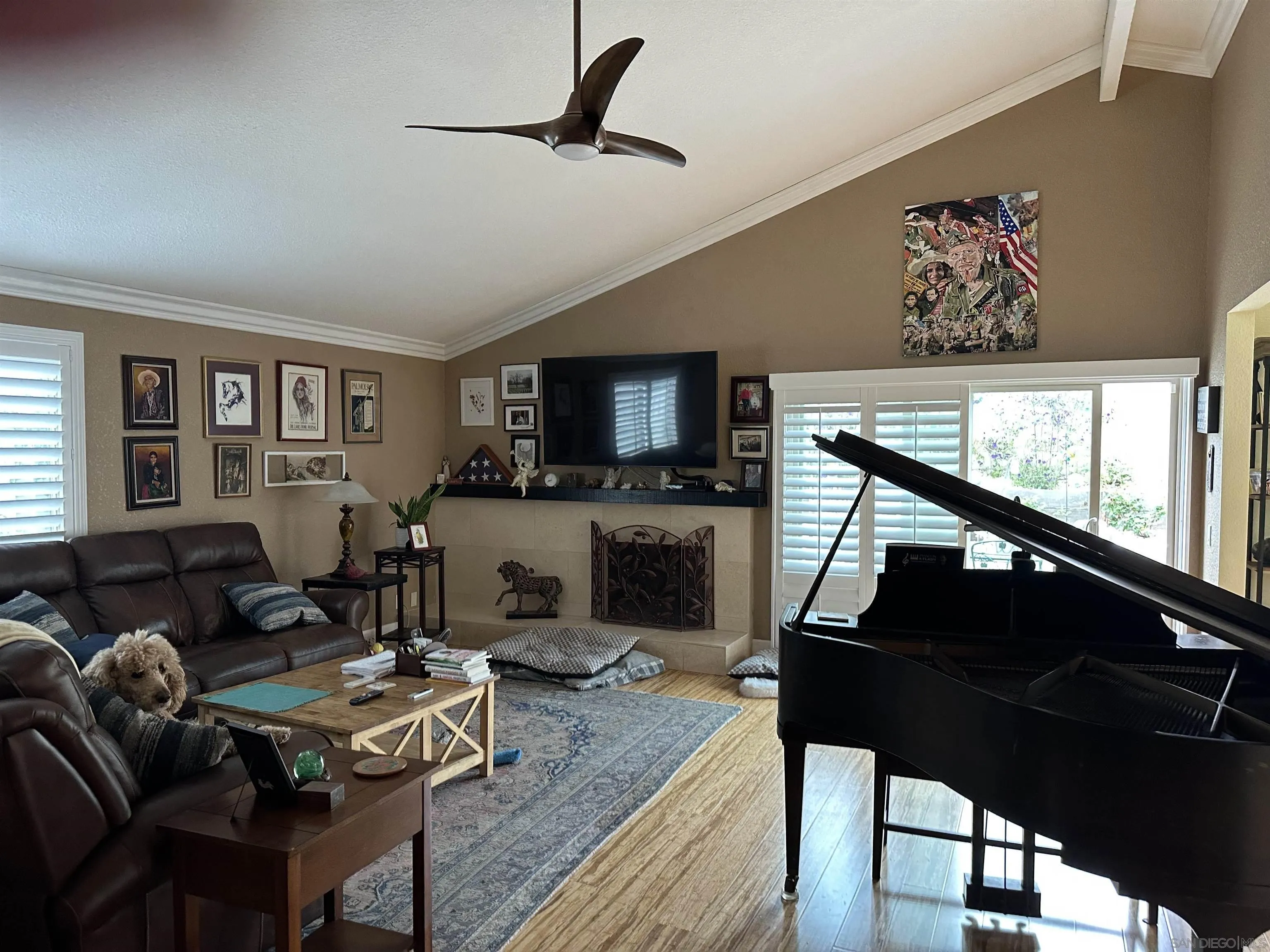 4318 Mirage Lane Oceanside, CA 92056 - Photo 3 of 17 a living room with furniture and a flat screen tv