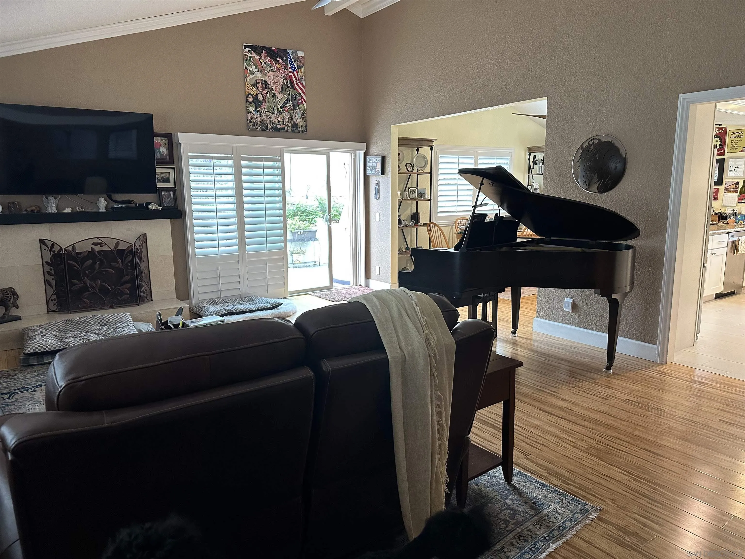 4318 Mirage Lane Oceanside, CA 92056 - Photo 7 of 17 a living room with furniture and a flat screen tv