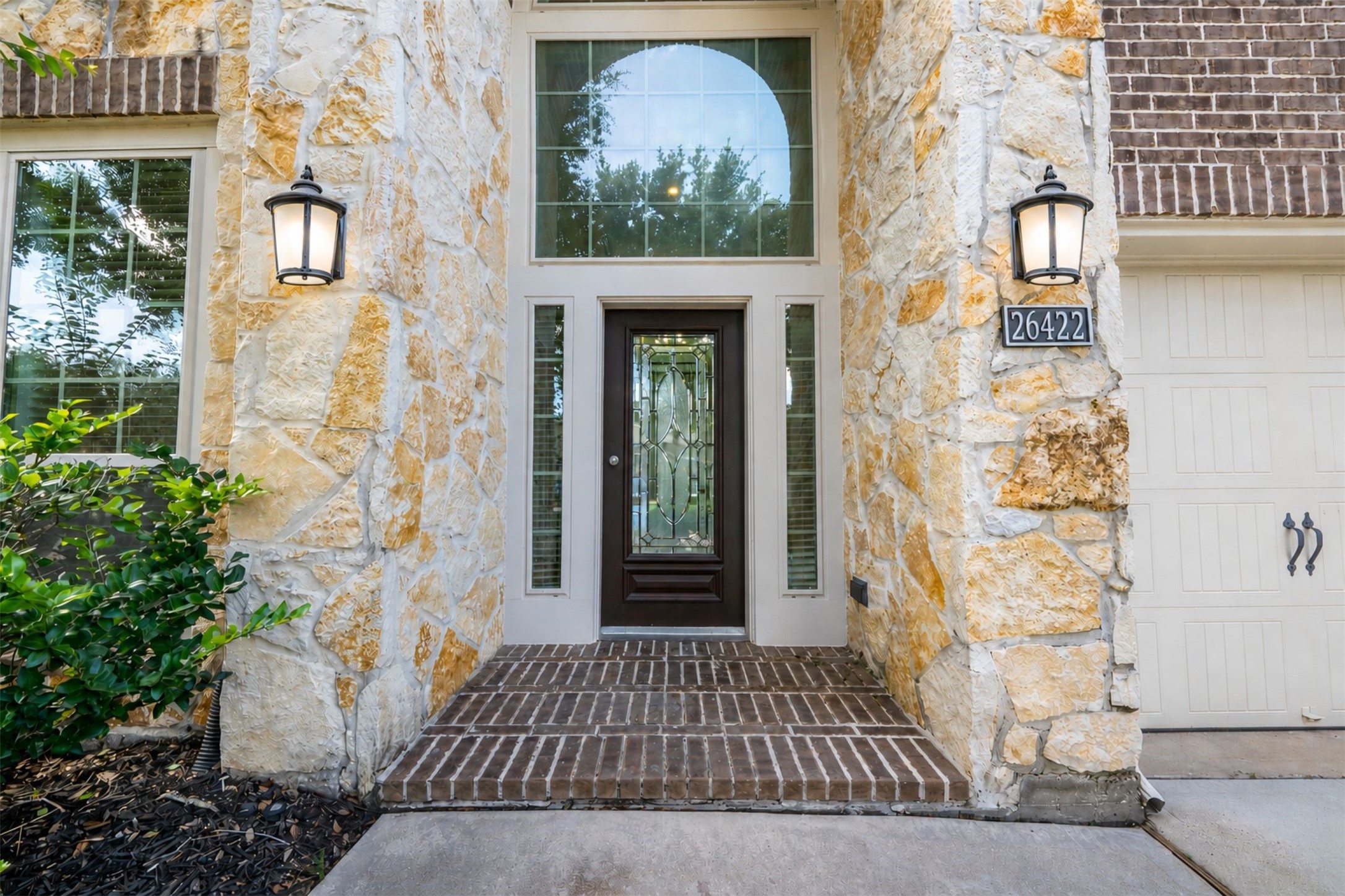 26422 Red Cliff Ridge Katy, TX 77494 - Photo 2 of 40 2-story stone, covered front porch, shelters the entry from the elements and packages are safe in rainy weather.
