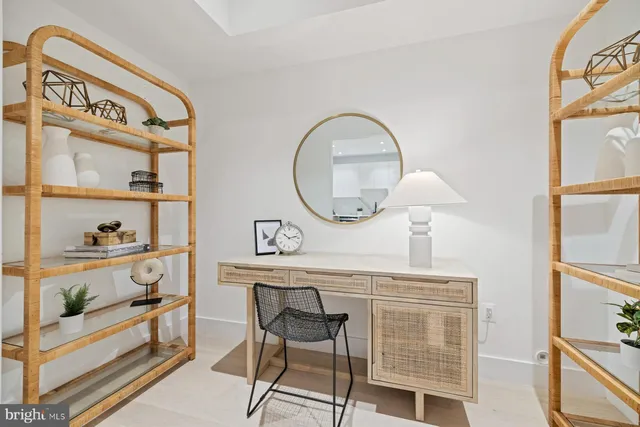 a view of a chair and table in a room