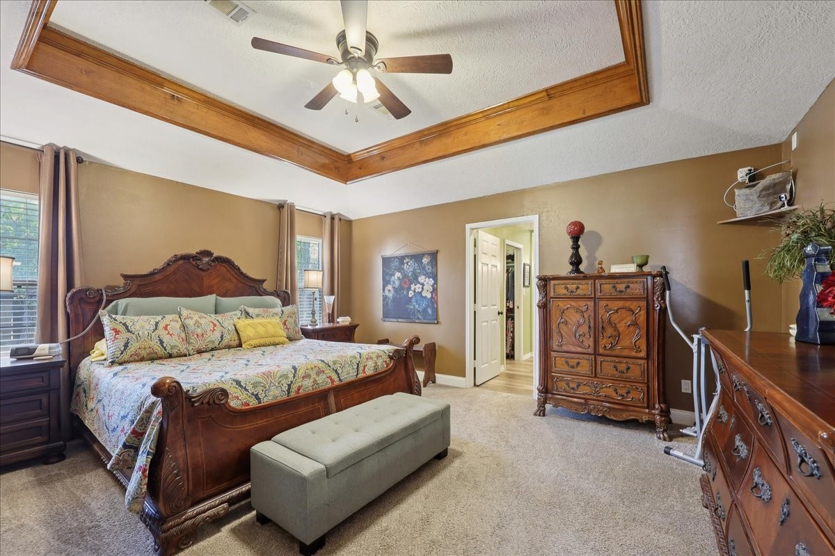 7769 Moonglow Circle Lumberton, TX 77657 - Photo 17 of 35 a bedroom with a bed and dresser