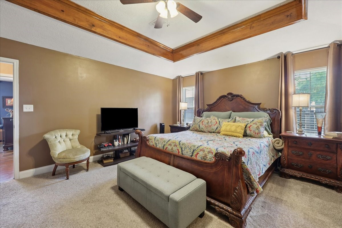 7769 Moonglow Circle Lumberton, TX 77657 - Photo 18 of 35 a bedroom with a bed and wooden floor