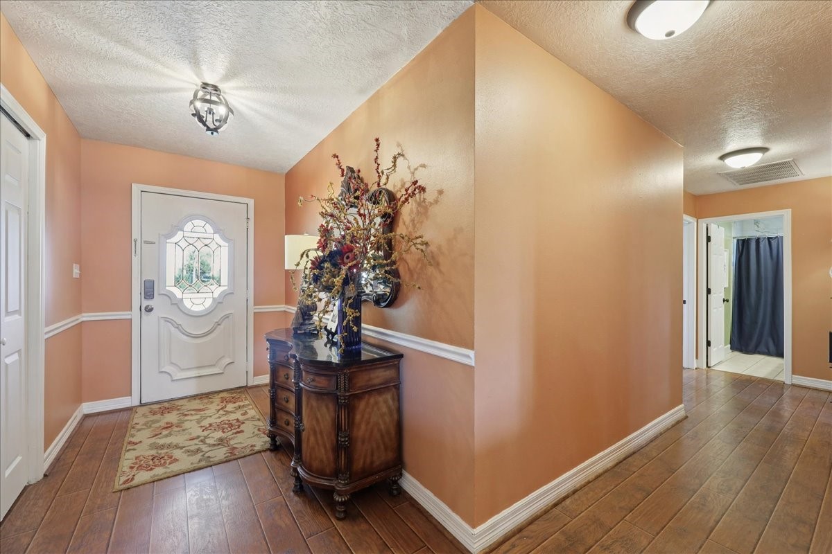 7769 Moonglow Circle Lumberton, TX 77657 - Photo 3 of 35 a view of entryway with wooden floor