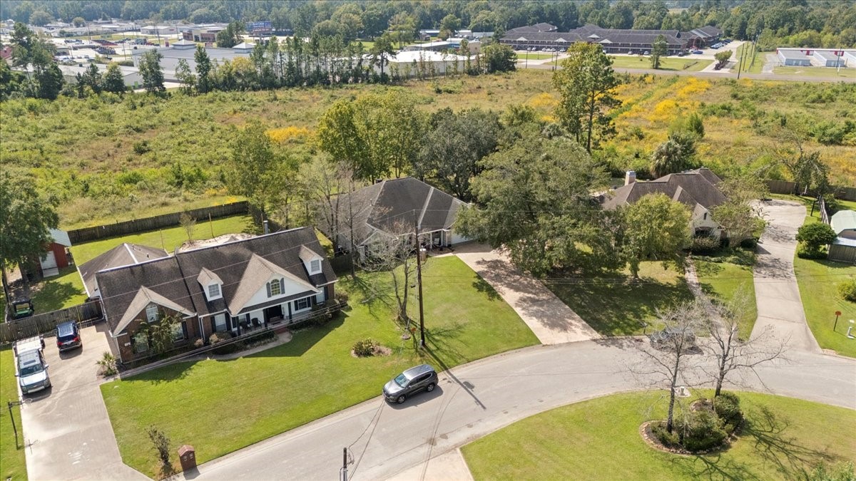 7769 Moonglow Circle Lumberton, TX 77657 - Photo 31 of 35 a view of a swimming pool with a lake view