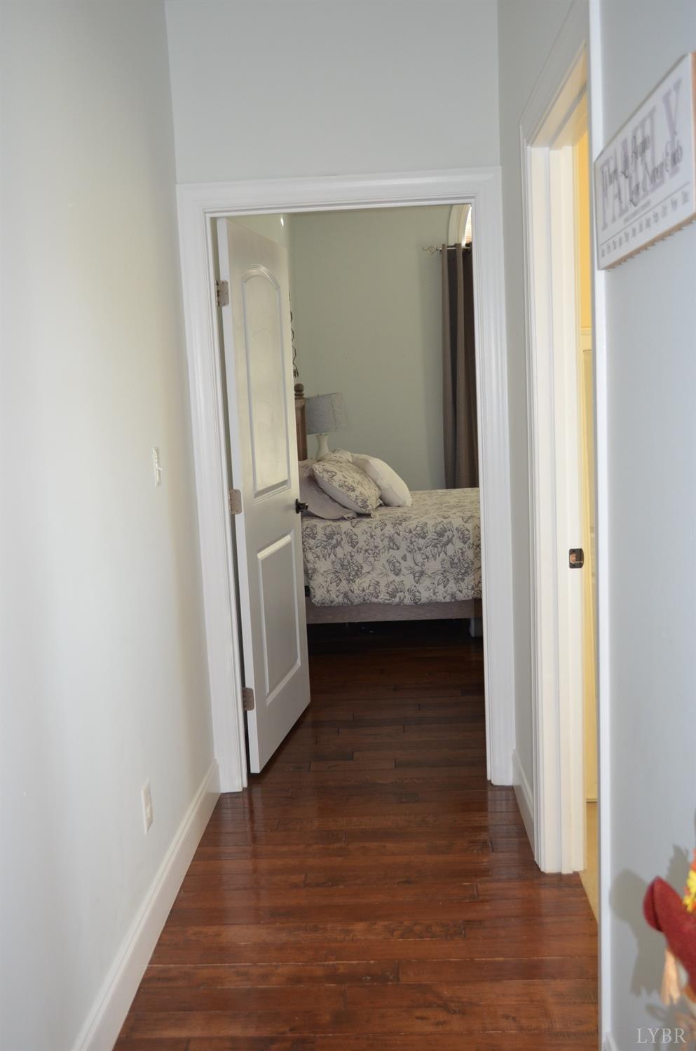 197 Alcock Road Amherst, VA 24521 - Photo 54 of 94 a view of bedroom with furniture and wooden floor