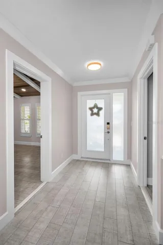 a kitchen with stainless steel appliances granite countertop a sink and a stove