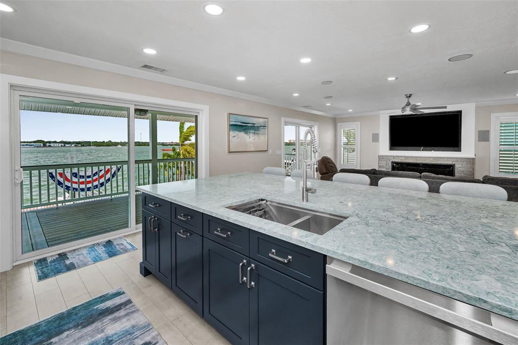 804 Bay Point Drive Madeira Beach, FL 33708 - Photo 68 of 100 a kitchen with a sink and a large window