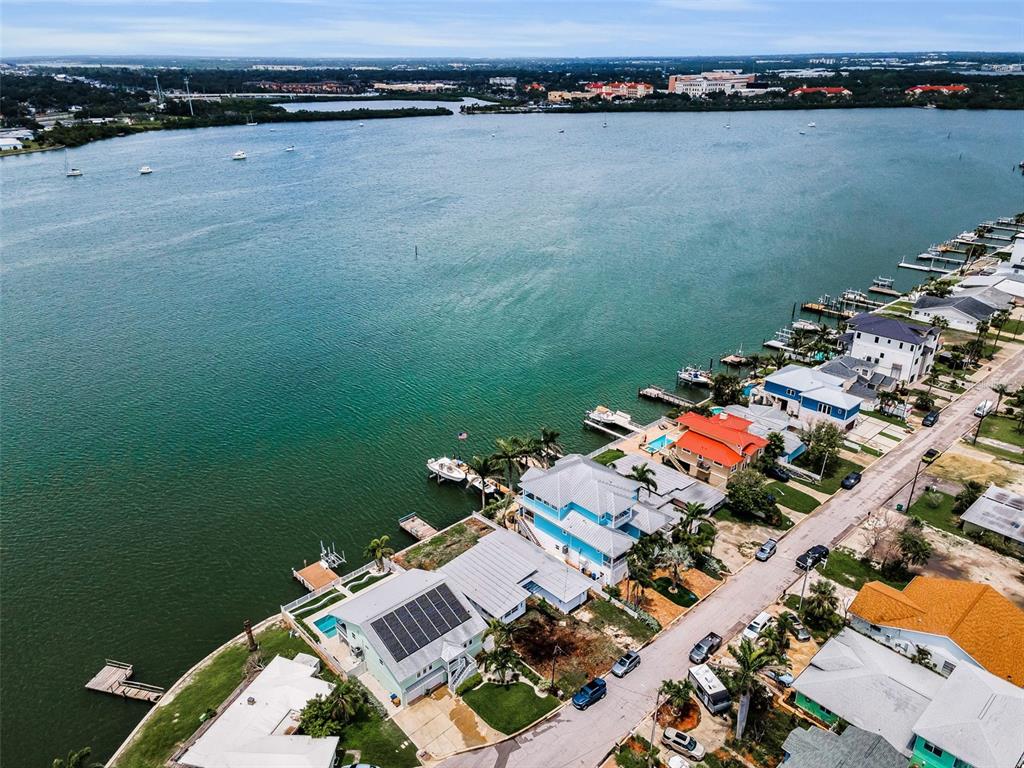 804 Bay Point Drive Madeira Beach, FL 33708 - Photo 9 of 100 an aerial view of a house with a lake view