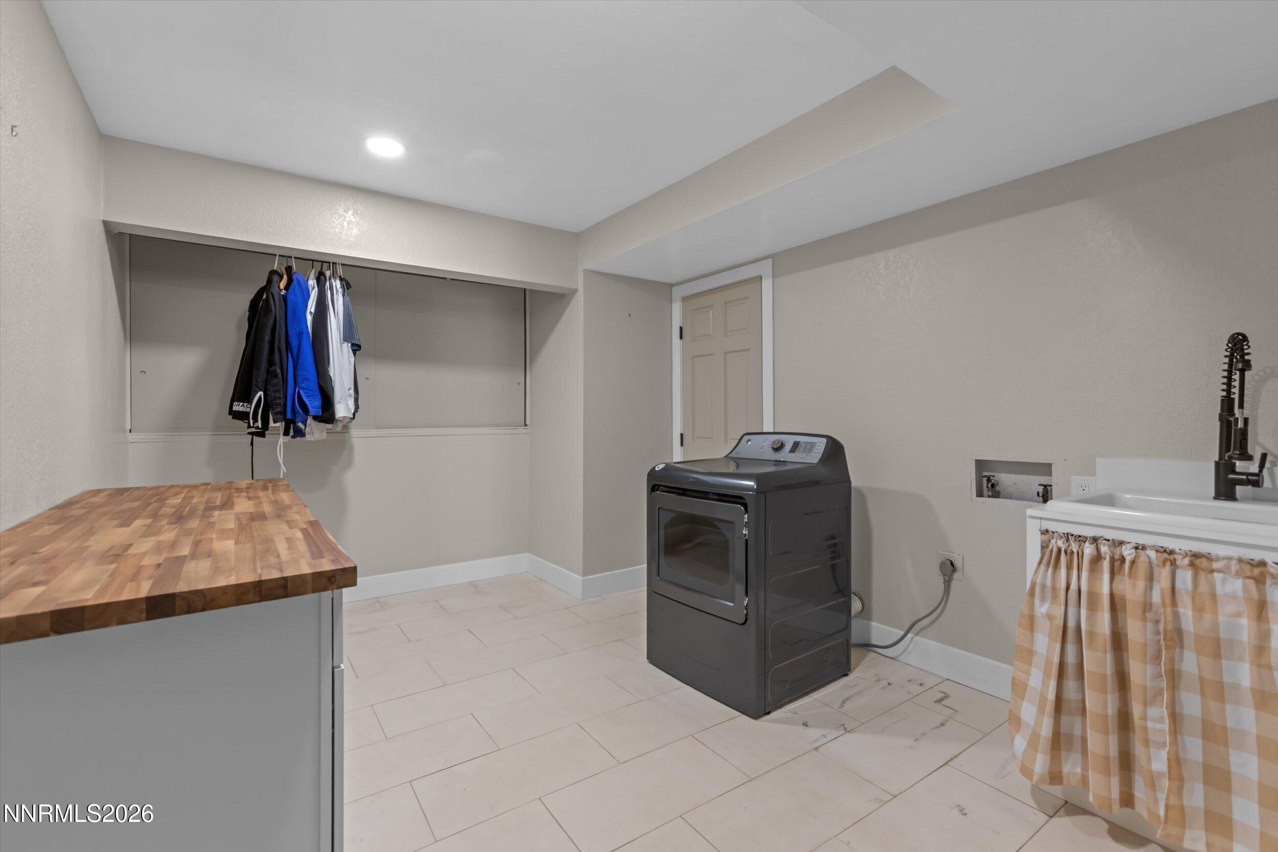 2725 West Lake Ridge Shores Reno, NV 89519 - Photo 43 of 49 a utility room with dryer and washer