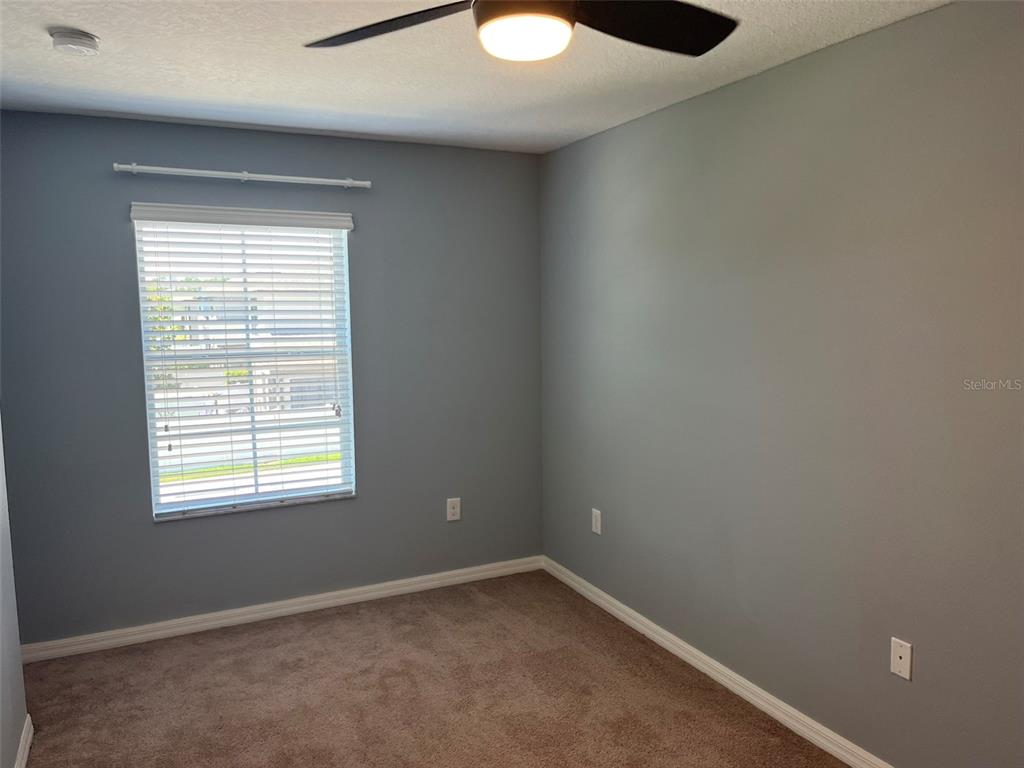 1242 Acadia Harbor Place Brandon, FL 33511 - Photo 15 of 28 an empty room with a window