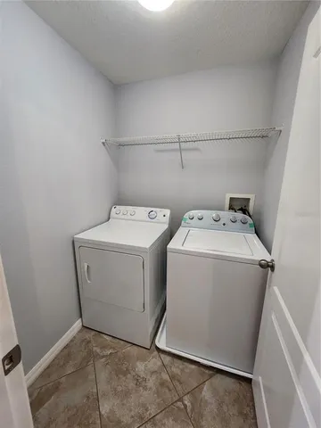 wooden floor in an empty room and a window