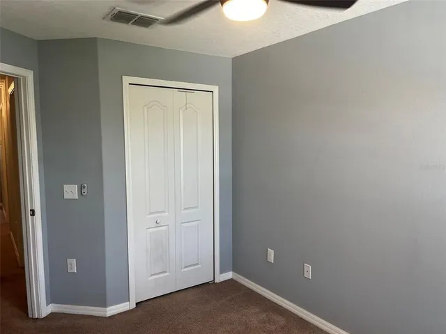 an empty room with closet