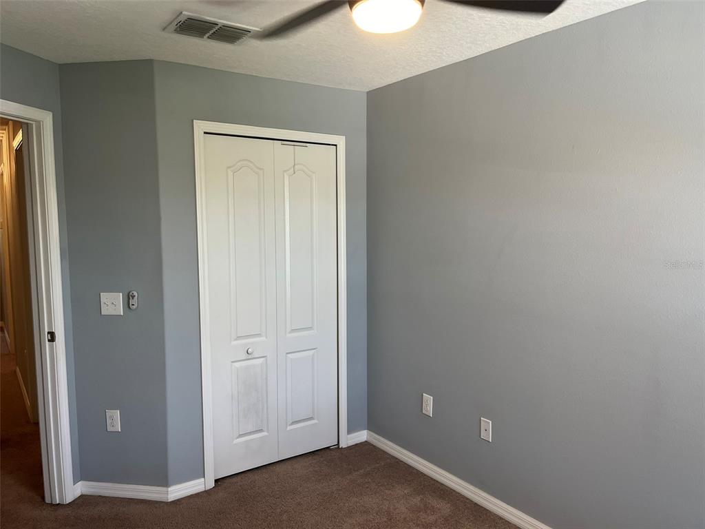 1242 Acadia Harbor Place Brandon, FL 33511 - Photo 16 of 28 an empty room with closet