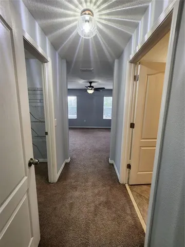 a view of a room with racks on the wall