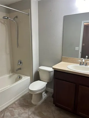 a bathroom with a sink a toilet and a bathtub