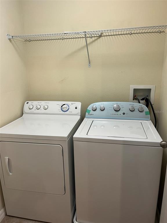 1242 Acadia Harbor Place Brandon, FL 33511 - Photo 25 of 28 a utility room with dryer and washer