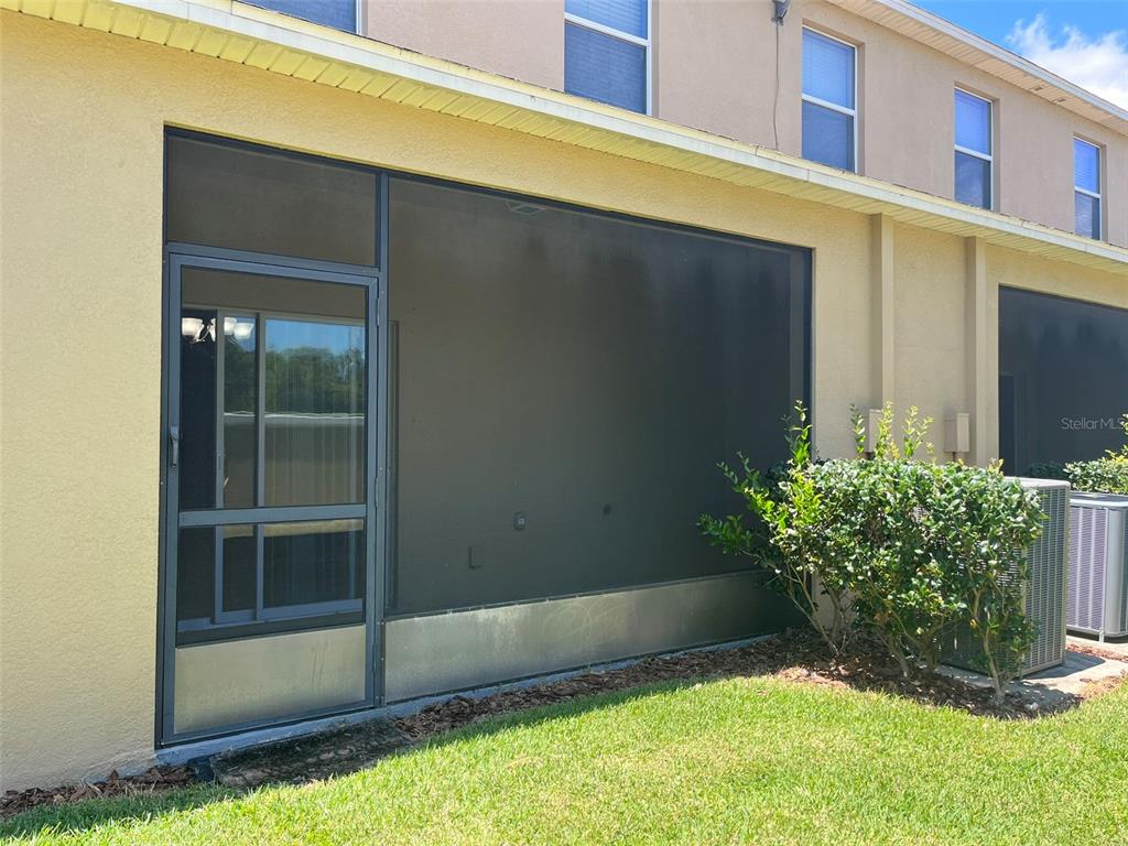 1242 Acadia Harbor Place Brandon, FL 33511 - Photo 26 of 28 a view of backyard with garden