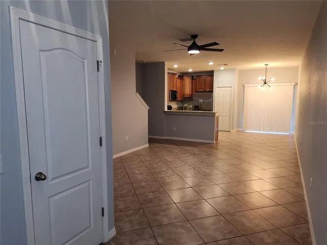 a view of a kitchen and a window