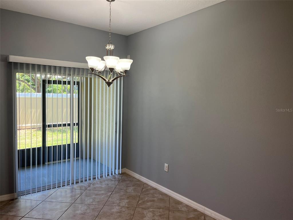 1242 Acadia Harbor Place Brandon, FL 33511 - Photo 10 of 28 a view of a chandelier in a room