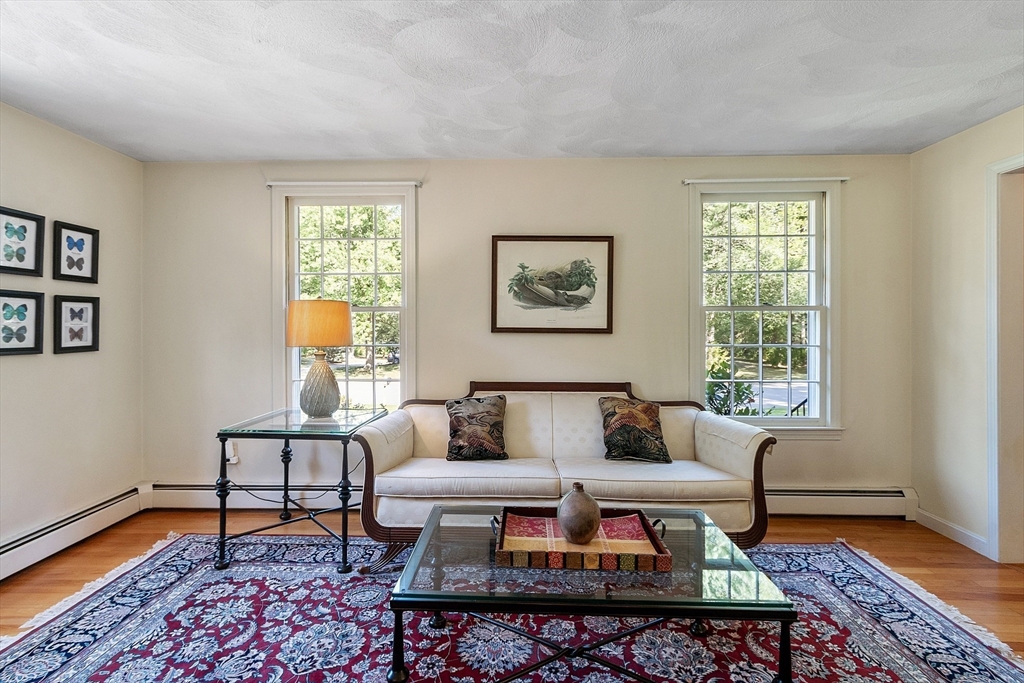 7 Countryside Way Andover, MA 01810 - Photo 19 of 38 a living room with furniture wooden floor and window