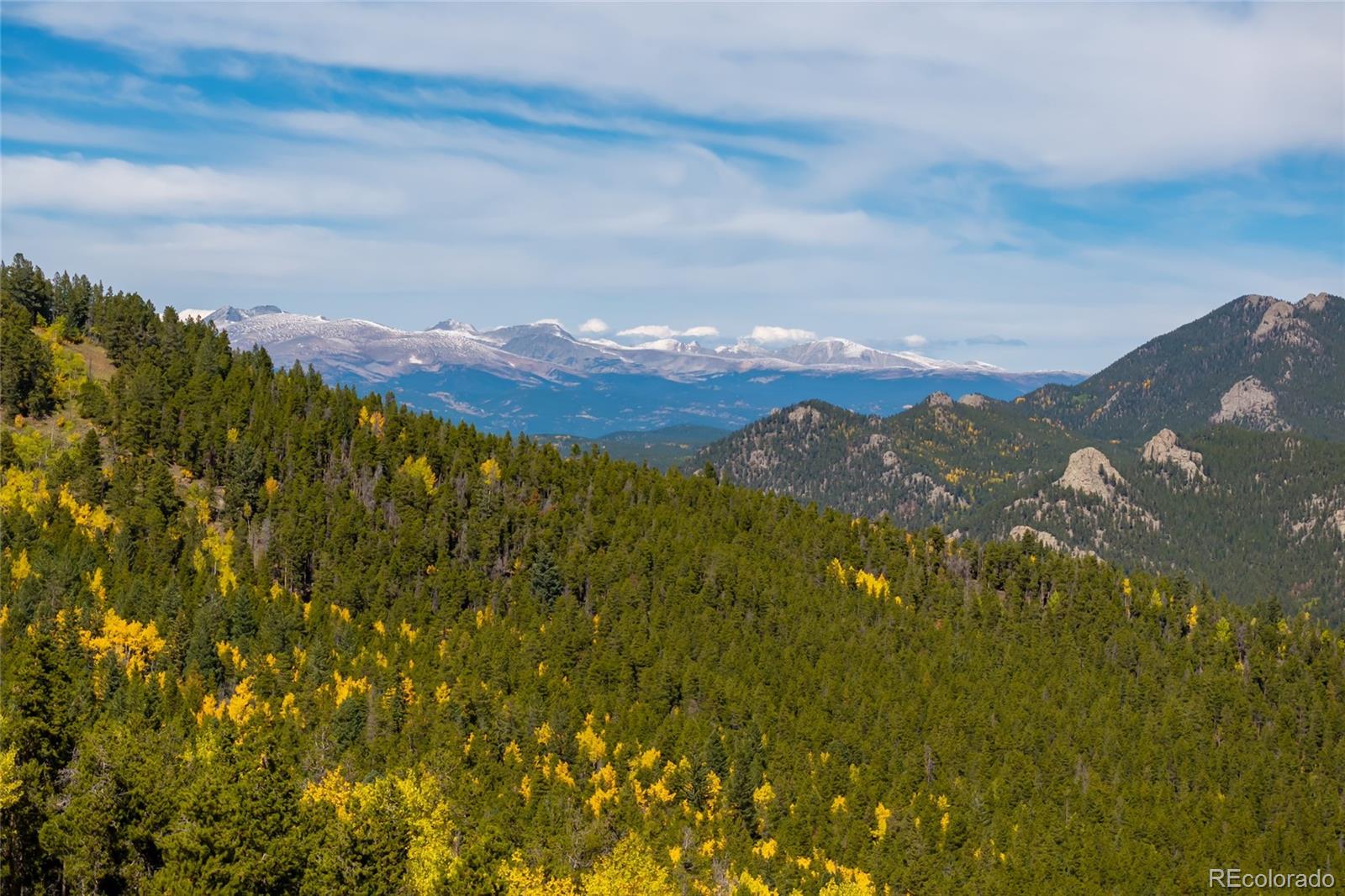 3 Seldom Seen Road Golden, CO 80403 - Photo 2 of 39 a view of a city with mountains in the background
