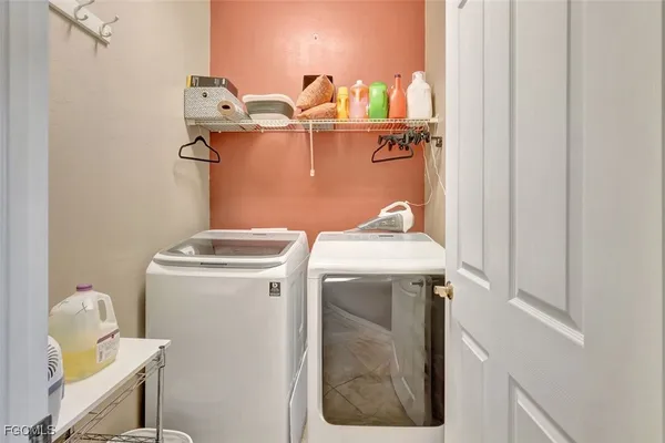 a kitchen with a sink stove and refrigerator