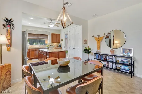a kitchen with granite countertop sink and a granite counter top