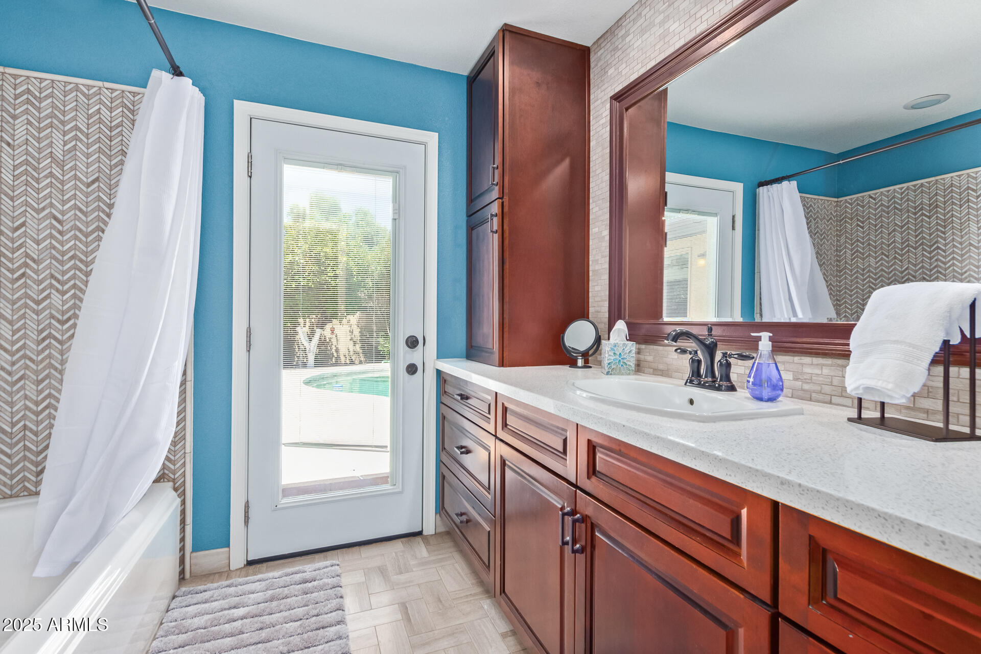 2118 East Pebble Beach Drive Tempe, AZ 85282 - Photo 23 of 33 a spacious bathroom with a double vanity sink and a mirror