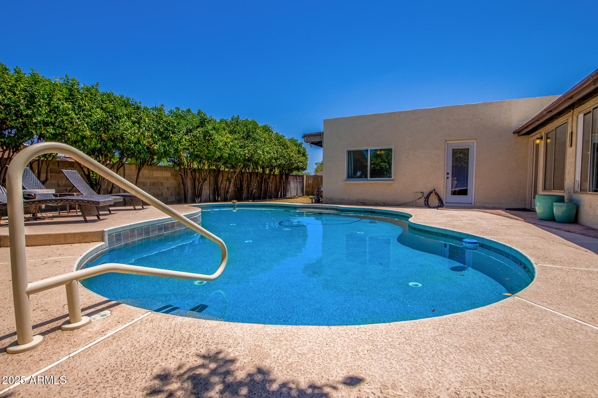 2118 East Pebble Beach Drive Tempe, AZ 85282 - Photo 31 of 33 a view of swimming pool with a backyard