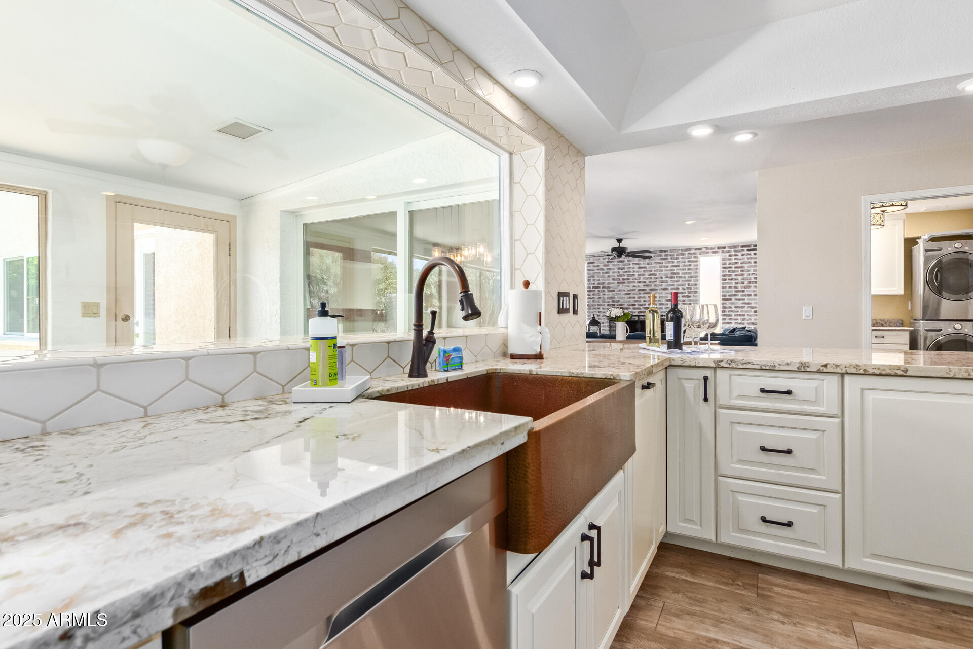 2118 East Pebble Beach Drive Tempe, AZ 85282 - Photo 10 of 33 a kitchen with sink a stove and cabinets