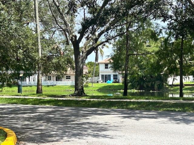 171 Northwest 75th Terrace Plantation, FL 33317 - Photo 22 of 32 Peaceful walkways