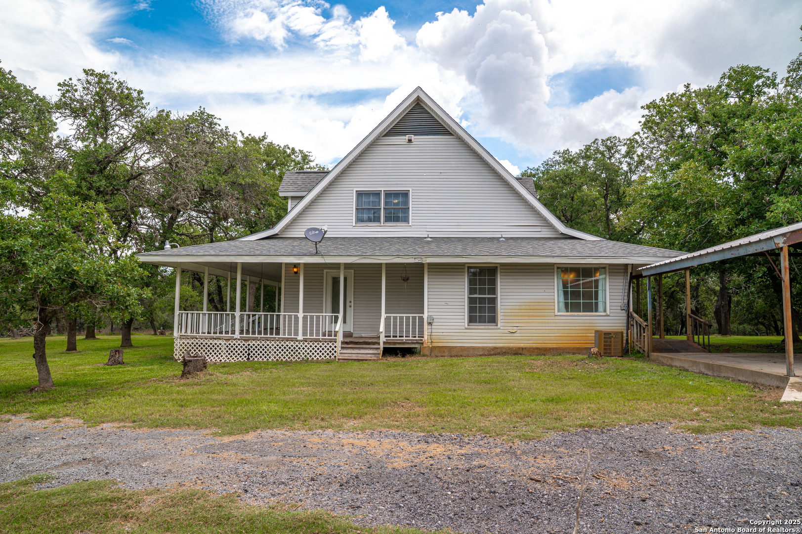 2981 Vivroux Ranch Road Seguin, TX 78155 - Photo 11 of 50 a front view of a house with a yard