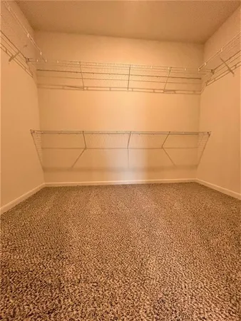 a view of a room with an empty space
