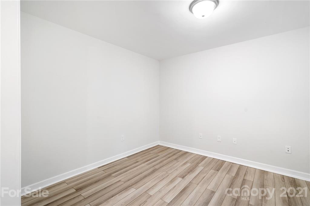 1174 South Rutherford Street Blacksburg, SC 29702 - Photo 11 of 40 a view of a room with wooden floor