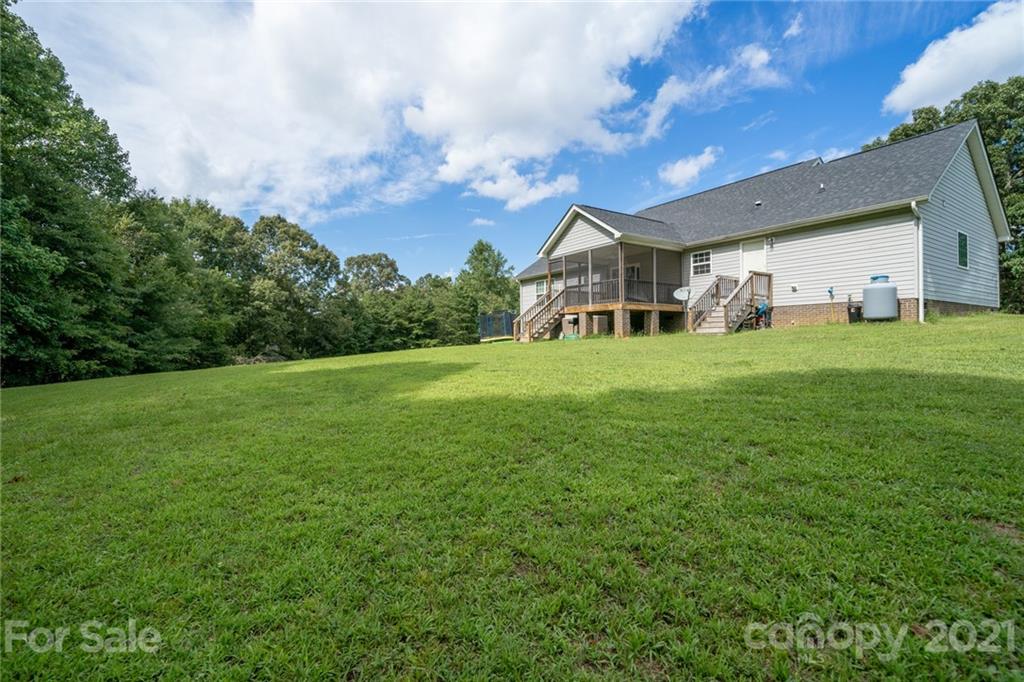 1174 South Rutherford Street Blacksburg, SC 29702 - Photo 35 of 40 a view of a big yard with a house