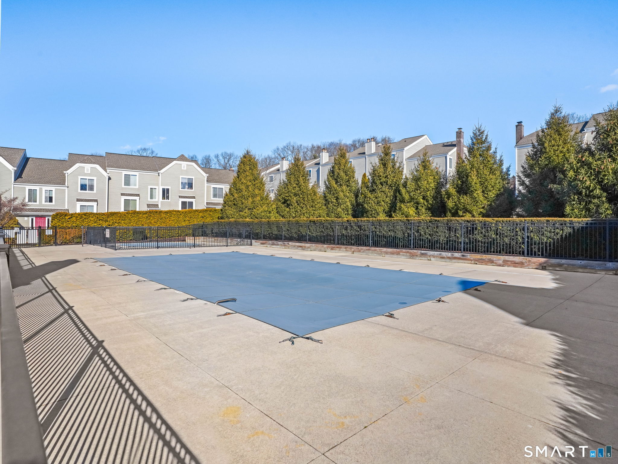 71 Aiken Street, Unit C8 Norwalk, CT 06851 - Photo 28 of 29 a view of swimming pool with an outdoor seating