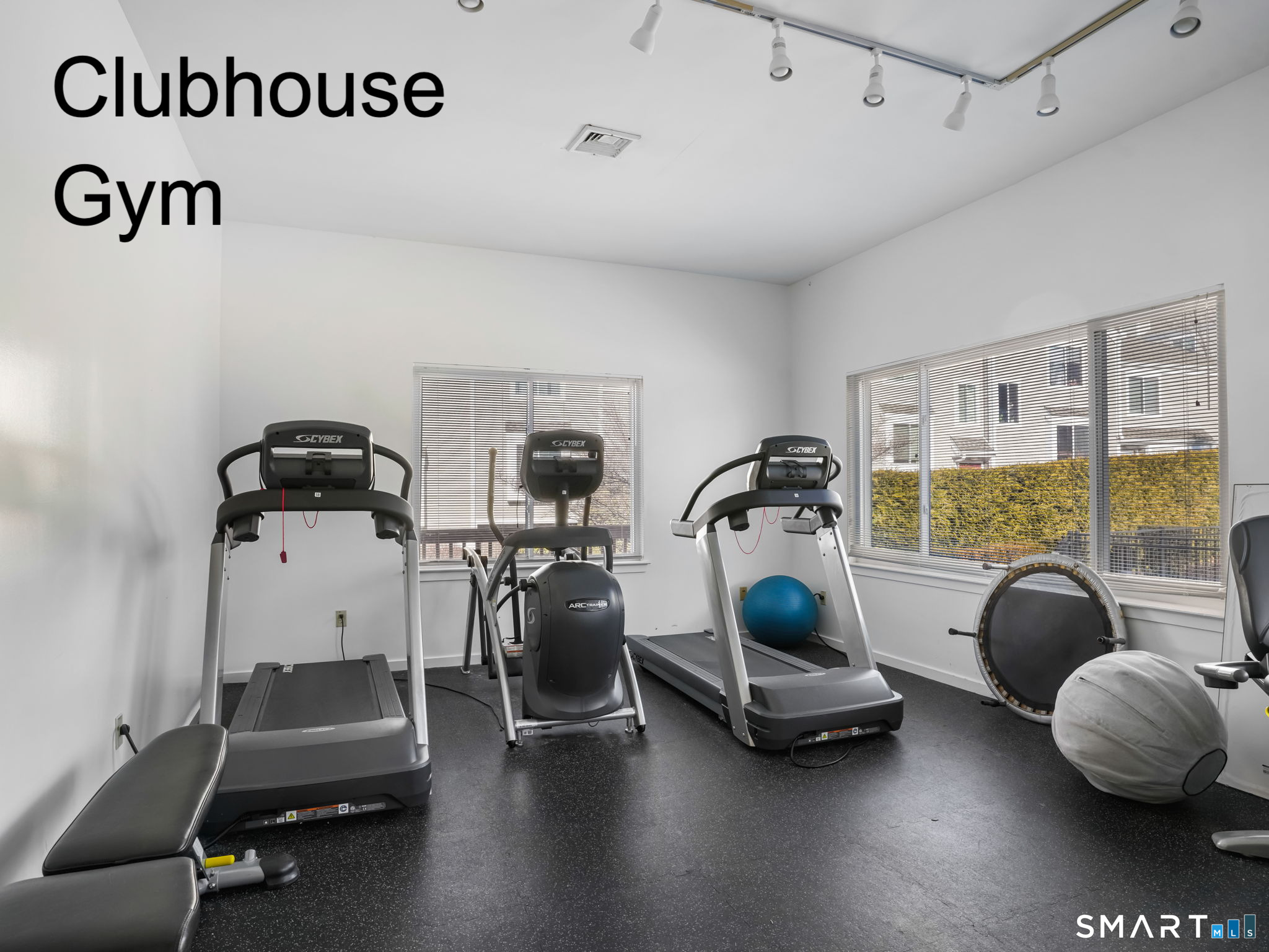 71 Aiken Street, Unit C8 Norwalk, CT 06851 - Photo 29 of 29 a room with gym equipment and a large window