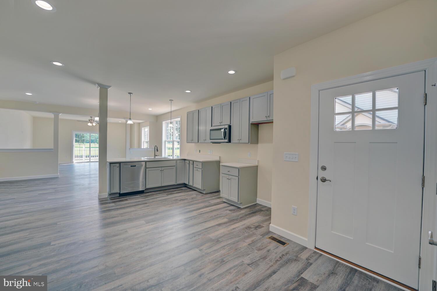 29 Mapledale Road Dover, DE 19904 - Photo 7 of 65 a view of kitchen with wooden floor