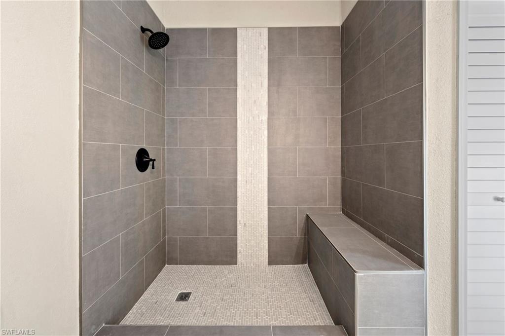 17397 Lee Road Fort Myers, FL 33967 - Photo 12 of 22 a bathroom with a shower